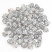 light grey natural diamond with a rough unpolished surface for custom jewelry creation