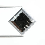 Lab grown diamond with square geometric cut featuring high contrast black and white faceting, sharp edges, and modern architectural design