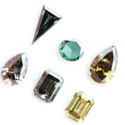 Fancy color lab grown diamond mixed shape CVD loose diamonds including emerald, pear, round and triangle cut for fine jewelry making.