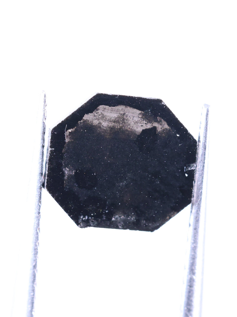Black octagonal sign on a white background