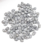 fancy grey natural diamond with an uncut rough texture for jewelry design