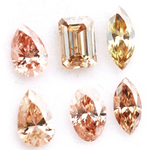 Fancy color lab grown diamond mix shape CVD loose diamonds including pear oval marquise emerald cut champagne and peach diamonds for engagement ring and custom fine jewelry making.