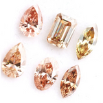 Fancy color lab grown diamond mix shape CVD loose diamonds including pear oval marquise emerald cut champagne and peach diamonds for engagement ring and custom fine jewelry making.