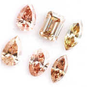 Fancy color lab grown diamond mix shape CVD loose diamonds including pear oval marquise emerald cut champagne and peach diamonds for engagement ring and custom fine jewelry making.