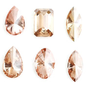 Fancy color lab grown diamond mix shape CVD loose diamonds including pear oval marquise emerald cut champagne and peach diamonds for engagement ring and custom fine jewelry making.
