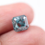 2.90 Ct fancy blue emerald lab grown diamond loose stone with soft blue color and clean rectangular step-cut facets for elegant custom jewelry design.