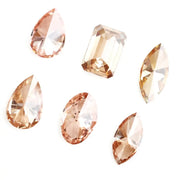 Fancy color lab grown diamond mix shape CVD loose diamonds including pear oval marquise emerald cut champagne and peach diamonds for engagement ring and custom fine jewelry making.