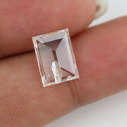 Emerald cut lab grown diamond with step facets, high clarity, transparent stone with visible internal inclusion, ethical IGI certified loose diamond for jewelry setting