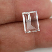 Emerald cut lab grown diamond with step facets, high clarity, transparent stone with visible internal inclusion, ethical IGI certified loose diamond for jewelry setting