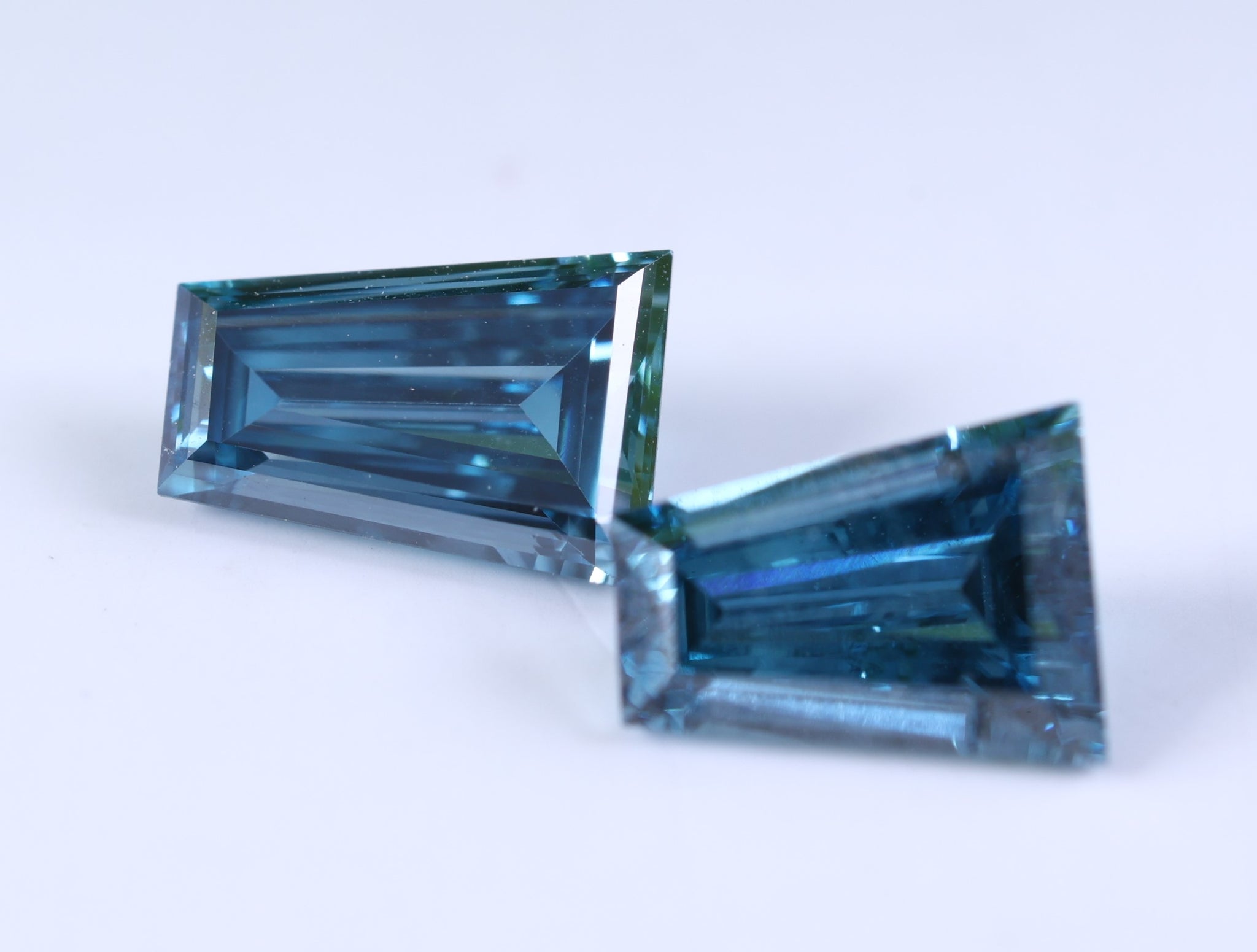 0.73 Carat Lab Grown Diamond Vivid Blue Tapered Baguette Cut Lab Diamond