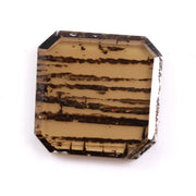 0.88 Ct brown Emerald cut lab grown diamond loose stone with geometric shape and rich brown color sparkle.