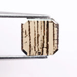 0.88 Ct brown Emerald cut lab grown diamond loose stone with geometric shape and rich brown color sparkle.