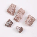 what does a diamond look like before it is cut, what does a diamond look like in the rough, black faceted diamond