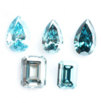 Fancy blue lab grown diamonds in pear and emerald cut shapes, ethical loose lab created diamonds for custom engagement rings and fine jewelry making.