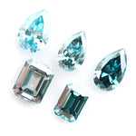 Fancy blue lab grown diamonds in pear and emerald cut shapes, ethical loose lab created diamonds for custom engagement rings and fine jewelry making.