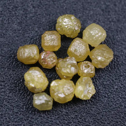 raw brown diamond raw green diamond raw white diamond raw yellow diamond with rough cut diamond engagement ring natural diamond stud earrings and natural diamond tennis necklace black faceted diamond