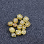 raw brown diamond raw green diamond raw white diamond raw yellow diamond with rough cut diamond engagement ring natural diamond stud earrings and natural diamond tennis necklace black faceted diamond