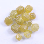 raw brown diamond raw green diamond raw white diamond raw yellow diamond with rough cut diamond engagement ring natural diamond stud earrings and natural diamond tennis necklace black faceted diamond