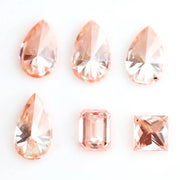 Fancy peach pink lab grown loose diamonds in pear, emerald and princess cut for custom engagement rings and fine jewelry making