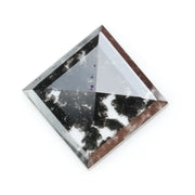 Square cut lab grown diamond with step facets, high clarity, mirror-like reflections, and visible inclusions on a neutral background