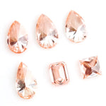 Fancy peach pink lab grown loose diamonds in pear, emerald and princess cut for custom engagement rings and fine jewelry making