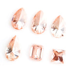 Fancy peach pink lab grown loose diamonds in pear, emerald and princess cut for custom engagement rings and fine jewelry making