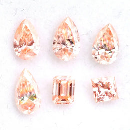 Fancy peach pink lab grown loose diamonds in pear, emerald and princess cut for custom engagement rings and fine jewelry making