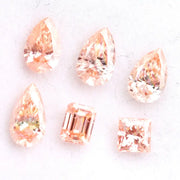 Fancy peach pink lab grown loose diamonds in pear, emerald and princess cut for custom engagement rings and fine jewelry making