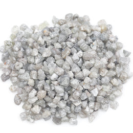 grey white earth mined diamond in natural rough form for jewelry crafting