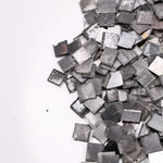 Fancy grey black lab grown rough diamond carré cut square slice loose diamond for custom jewelry making and modern engagement ring design.
