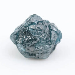 loose raw diamonds with natural rough surfaces suitable for custom jewelry creations.