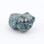 loose raw diamonds displaying natural rough surfaces for custom jewelry and gemstone projects.