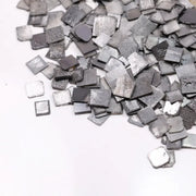 Fancy grey black lab grown rough diamond lot with square slice Carré cut tiles, raw CVD diamonds for custom jewelry making and unique engagement ring designs.