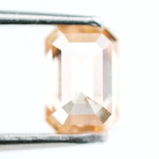 0.53 Ct fancy brown emerald cut lab grown diamond with elegant step cut facets, premium loose diamond for custom jewelry designs.