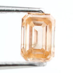 0.53 Ct fancy brown emerald cut lab grown diamond with elegant step cut facets, premium loose diamond for custom jewelry designs.