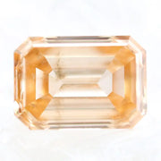 0.53 Ct fancy brown emerald cut lab grown diamond with elegant step cut facets, premium loose diamond for custom jewelry designs.