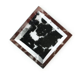 Square-cut lab-grown diamond with distinctive black and white patterned inclusions, polished facets, and high clarity for engagement rings, fine jewelry, and collector’s pieces