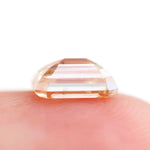 0.53 Ct fancy brown emerald cut lab grown diamond with elegant step cut facets, premium loose diamond for custom jewelry designs.