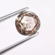 0.51 Ct Round cut White & brown lab created diamond with clean geometric step facets and elegant sparkle