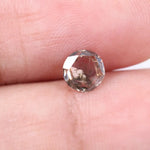 0.51 Ct Round cut White & brown lab created diamond with clean geometric step facets and elegant sparkle