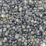 assorted natural rough diamonds in varied colors and irregular shapes for custom engagement ring designs