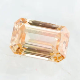 0.67 Ct brown emerald cut lab grown diamond with elegant step cut facets and rich warm tone, loose fancy diamond for custom jewelry making. 