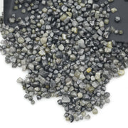 assorted natural rough diamonds in varied colors and irregular shapes for custom engagement ring designs