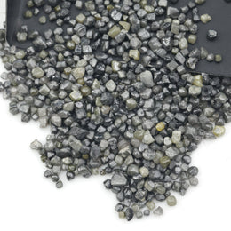 assorted natural rough diamonds in varied colors and irregular shapes for custom engagement ring designs