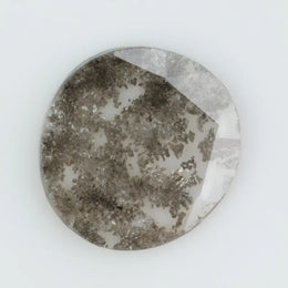 Round lab-grown diamond with unique gray inclusions, faceted for maximum sparkle, ethically created, ideal for custom rings and jewelry