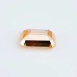 0.67 Ct brown emerald cut lab grown diamond with elegant step cut facets and rich warm tone, loose fancy diamond for custom jewelry making. 