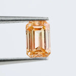 0.67 Ct brown emerald cut lab grown diamond with elegant step cut facets and rich warm tone, loose fancy diamond for custom jewelry making. 