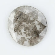 Round lab-grown diamond with unique gray inclusions, faceted for maximum sparkle, ethically created, ideal for custom rings and jewelry
