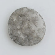 Round lab-grown diamond with unique gray inclusions, faceted for maximum sparkle, ethically created, ideal for custom rings and jewelry