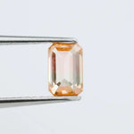 0.67 Ct brown emerald cut lab grown diamond with elegant step cut facets and rich warm tone, loose fancy diamond for custom jewelry making. 